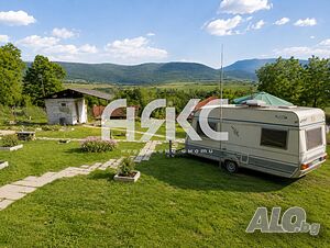 Продаваме парцел 820 кв.м с виза за строеж, ток, вода и обзаведена каравана - с. Златна Панега