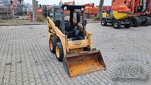 Komatsu SK510-5 Мини товарач