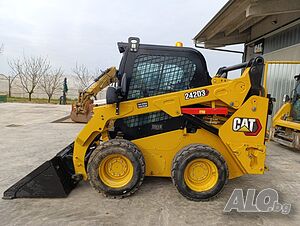 Caterpillar 242D3 - Мини колесен товарач