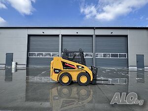Caterpillar 216B3 Мини челен товарач