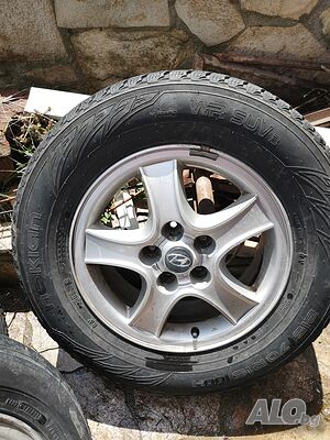 Всесезонни гуми с джанти 215/70 R16