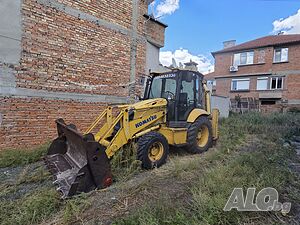 Услуги с комбиниран багер Komatsu wb 93