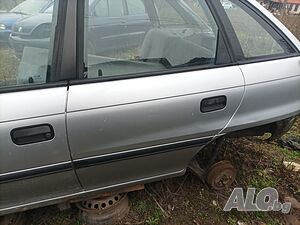 Задна лява врата за Опел Астра F. Хечбек. 93 год. Сива.