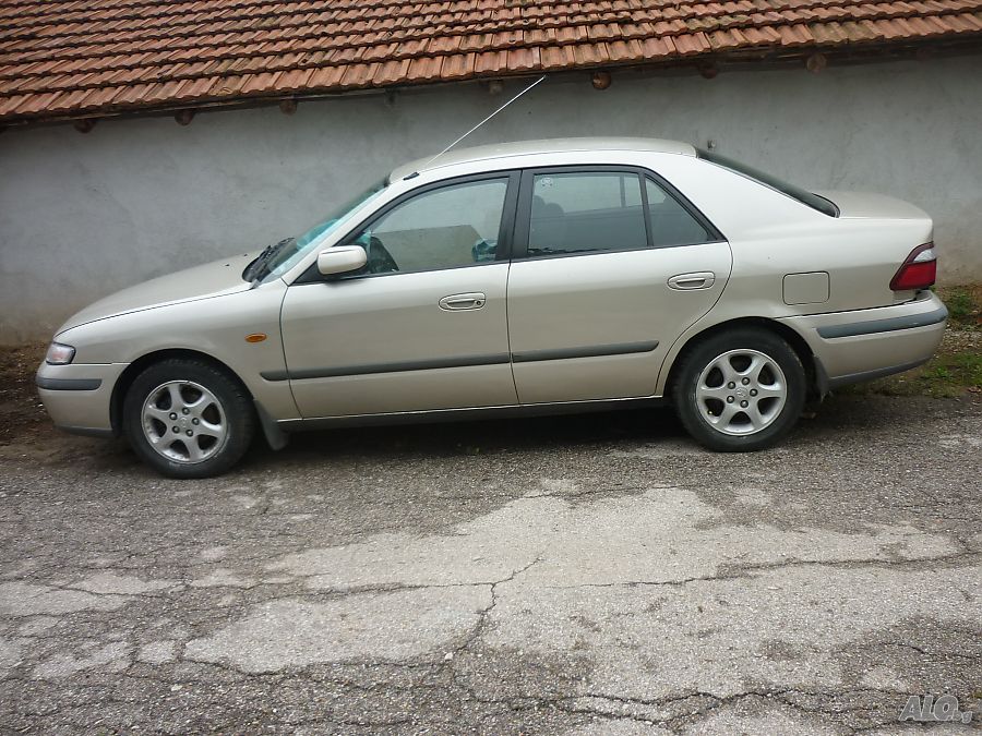 Машина Mazda 627