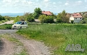 2 бр. в регулация за 3 къщи от 1800 кв.м. в Черни връх на гл. път