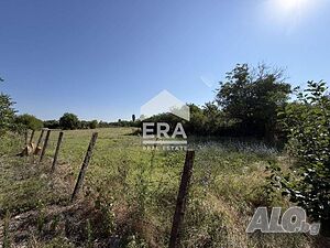 САМО В ЕРА ИМОТИ ХАСКОВО! Равен парцел на асфалтиран път в с. Книжовник