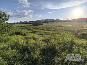 Парцел с площ от 11580 кв.м, разположен в кв. Атюрен, 99м. лице на главен път Стара Загора-София