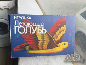 Летящ гълъб - Стара руска играчка птичка