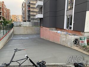 Полагане на ресан бетон по рампи и паркинги
