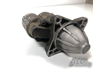 Стартер Mazda Demio 1.3 2001г