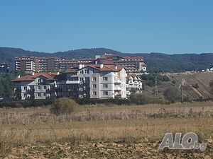 Парцел 3 дк. в село Баня община Разлог на 300 м. от пътя Баня - Банско