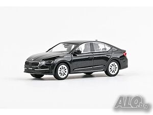 Skoda Octavia IV FL 2024 - мащаб 1:43 на Abrex моделът е нов в PVC дисплей-кейс