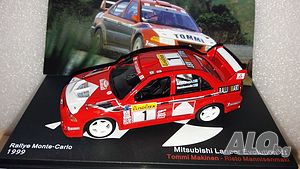 Mitsubishi Lancer Evo VI Rally Monte-Carlo 1999 - мащаб 1:43 на IXO/Altaya модела е нов