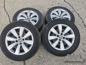 Джанти с летни гуми 185/65 R15 и тасове за Рено Клио 5