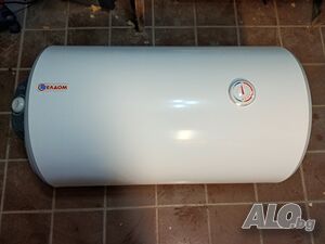Продавам хоризонтален бойлер Елдом 80л., 3kw, ел захранване и изводи за вода отляво.