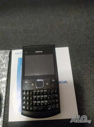 Телефон Nokia X2-01 QWERTY-клавиатура, microSD, Bluetooth. Камера0.3MP черен