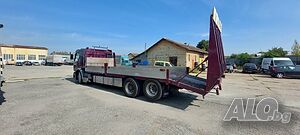 Транспортни услуги превоз на трактори и строителни машини