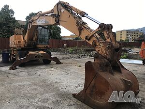 багер колесен case wx 210