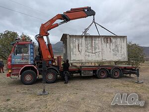 Преместване, транспорт на бетонни гаражи с кран-камион