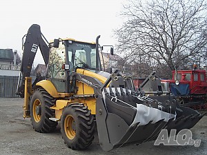 Изкопи с комбиниран багер Volvo Bl71