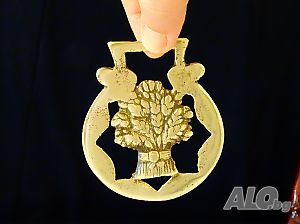 Бронзова апликация за конска сбруя, житен клас, богатство.