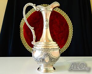 Посребрена медна кана, рози, орнаменти.