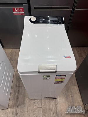 Пералня AEG с горно зареждане с ПАРА