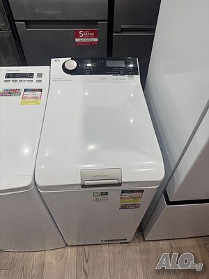 Пералня с горно зареждане AEG с пара