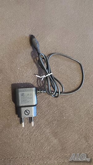 Зарядно HQ8505 за самобръсначки и машинки за подстригване PHILIPS