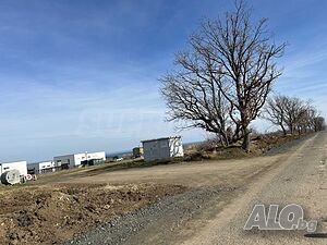 Парцел в регулация, с панорама море, за инвестиция до с. Лозенец