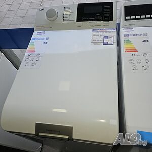 пералня с горно зареждане AEG