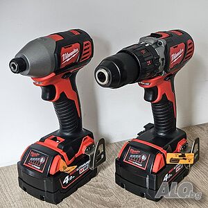 НОВ комплект Milwaukee M18 ударни винтоверти с 2 батерии 4Ah, зарядно и куфар