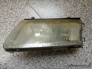 Оригинален ляв фар за VW Passat B5