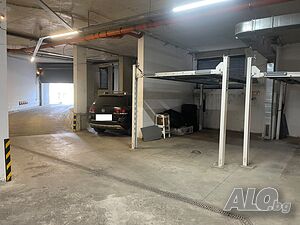 Под наем Двойно подземно паркомясто с автоподемник за 2 коли в Център Одесос, ул. „Козлодуй“ 34