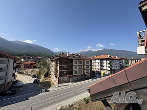 Двустаен апартамент с камина за продажба в жилищна сграда в Банско