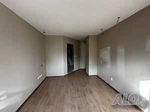 Тристаен необзаведен апартамент с две бани в жилищна сграда „Гранд Банско 1“ в Банско